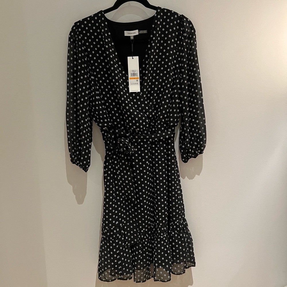 Calvin Klein black flowy dress, size small. New with tags.